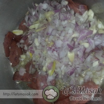 Add chopped onion and garlic
