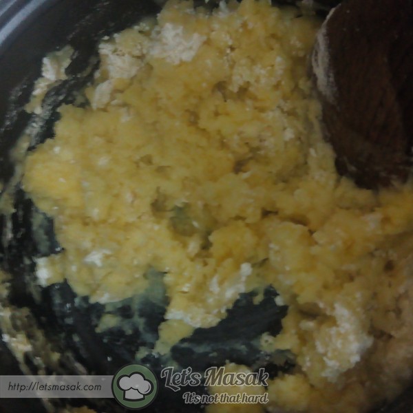 Once boiled, remove from heat and add the flour all at once and mix with a wooden spoon.